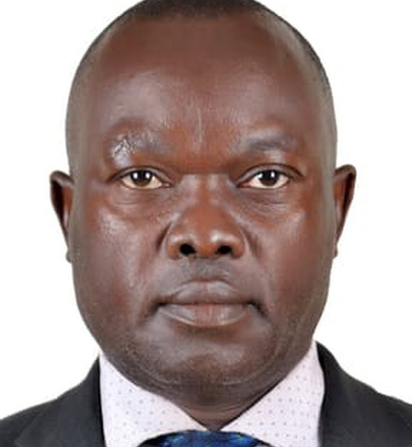 Data_PP_Photo_4_2025 Close-up of a serious African man in a suit and tie.